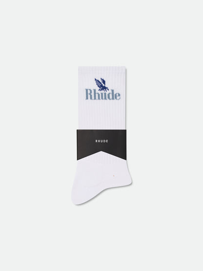 Single white ribbed sock with a blue eagle and Rhude logo and a black RHUDE paper band