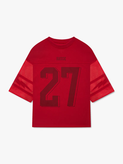 Red mesh football jersey with sheer lightning bolt striped sleeves, a dark red number 27 and RHUDE logo, front view