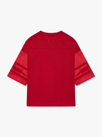 Red mesh football jersey with sheer tonal lightning bolt striped sleeves, back view