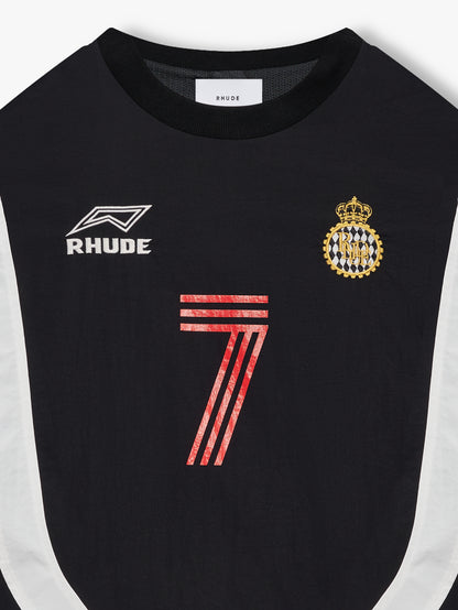 Close-up of the white RHUDE logo, embroidered crown crest and red striped 7 on the vintage black crewneck