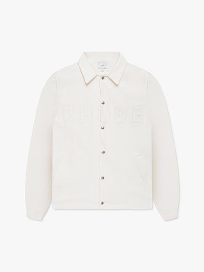 White coaches jacket with tonal embroidered RHUDE lettering across the chest, a snap front and point collar, front view