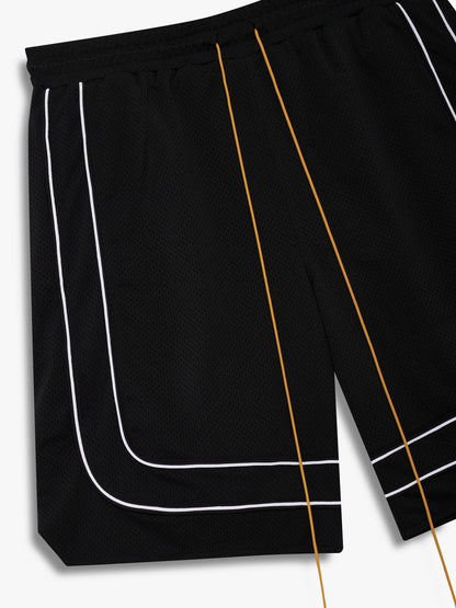 Angled close-up of the white double piping and long tan drawcords on the black mesh basketball shorts
