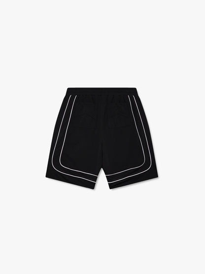 Black mesh basketball shorts with white double piping and back patch pockets, back view