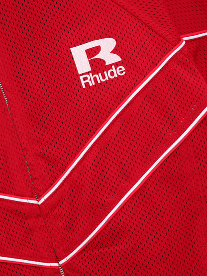 Detail of the red mesh fabric with a white R Rhude logo and chevron piping