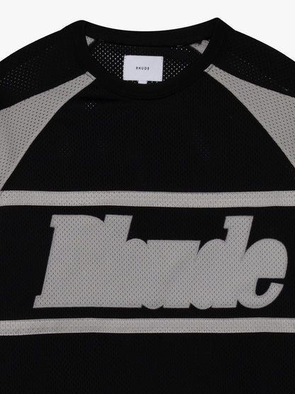 Close-up of the neckline, grey raglan sleeves and large grey Rhude chest logo on the black mesh moto shirt