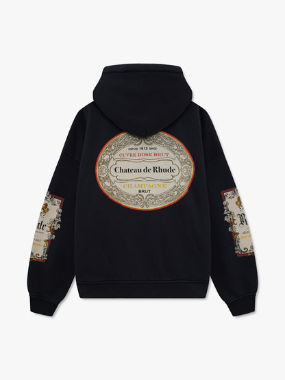 Vintage black zip-up hoodie with a large oval “Chateau de Rhude” champagne label print on the back, back view