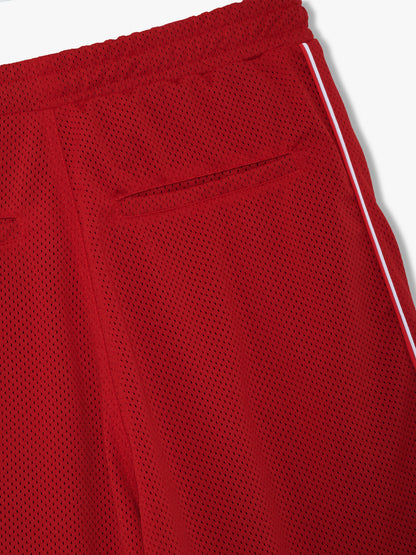 Detail of the red mesh fabric with a rear welt pocket and white side piping