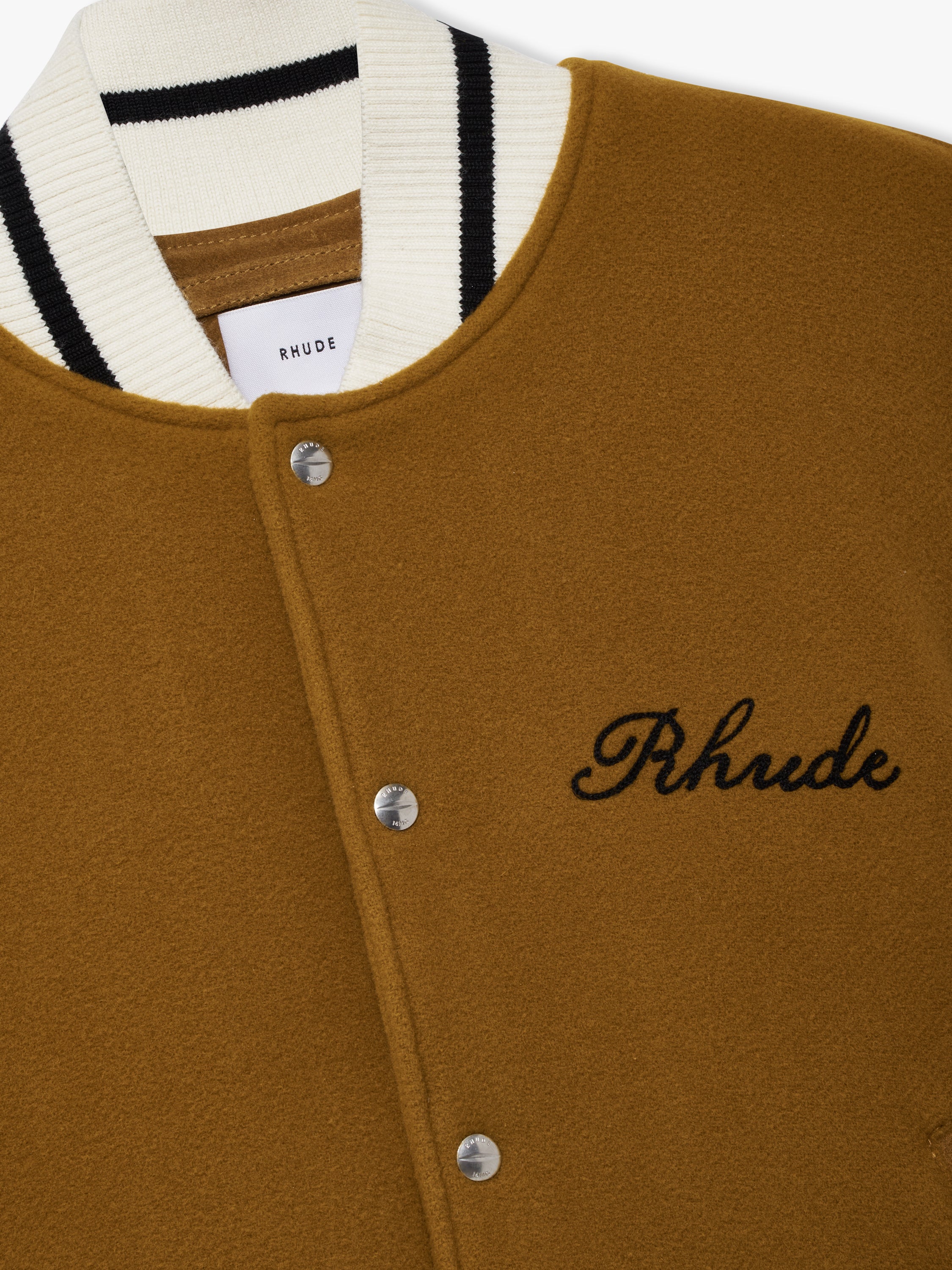R H U D E