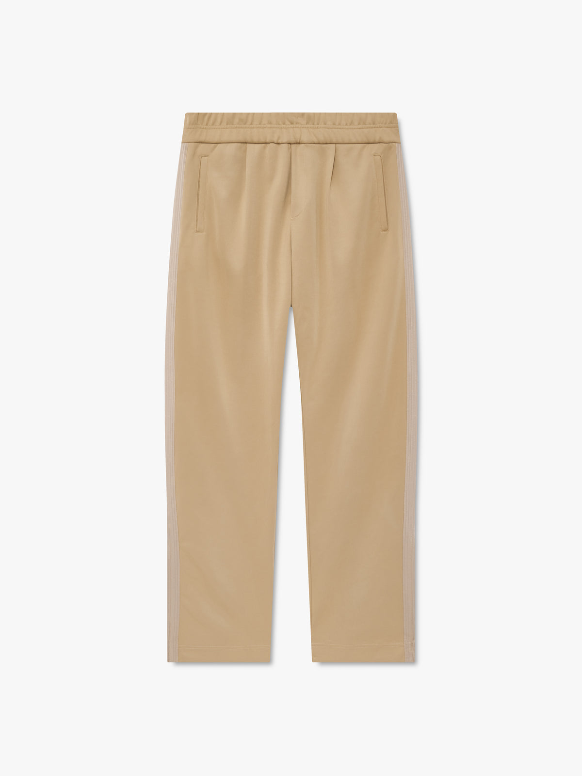 Tan track pants with an elastic waist, front pintucks, slant pockets and tonal side stripes, front view