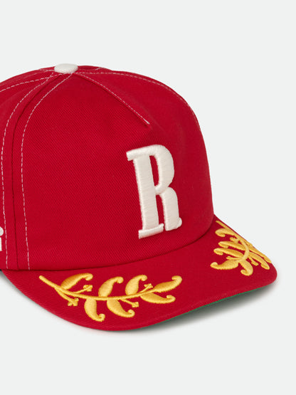 Red cap with a raised white R and gold laurel brim embroidery, three-quarter view