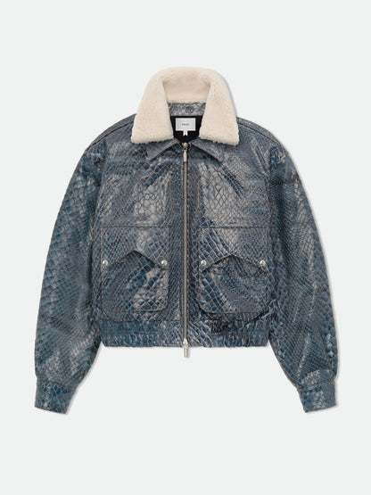 Navy crocodile-textured pilot jacket with a plush cream collar, zip front and snap flap pockets, front view