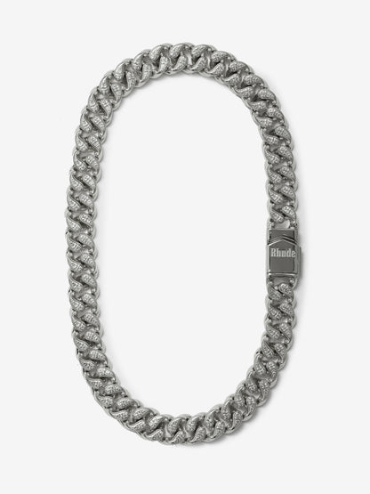 Sterling silver chain necklace with darkened paisley-patterned curb links and a box clasp engraved Rhude, front view